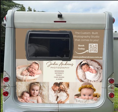 Rear of the Jodie Andrews Photography mobile studio with newborn and family photos